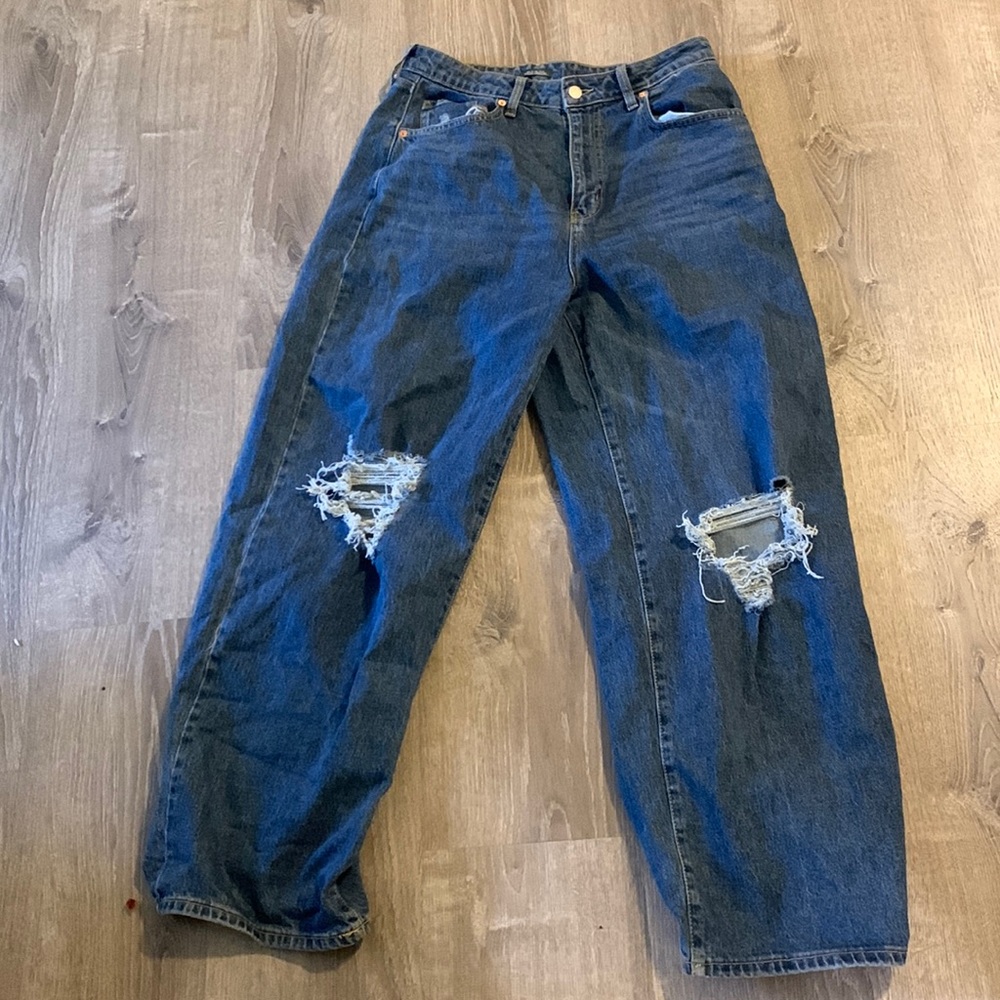 Baggy ripped blue jeans